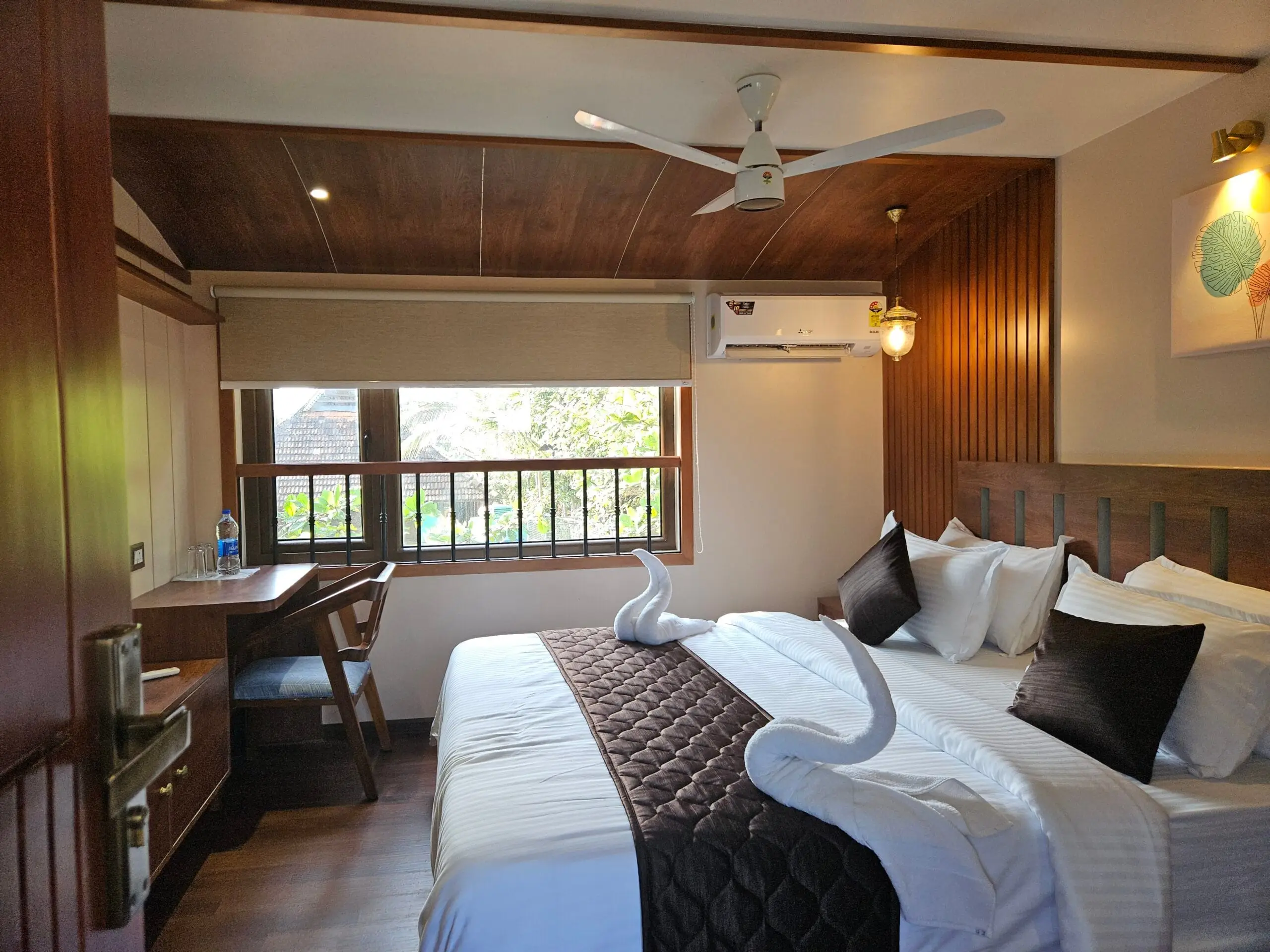 High-End Elite Glass-Walled Luxury Houseboat in Alleppey sailing over open waters